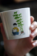 Load image into Gallery viewer, SOLO COLOURED CUP - BOY WITH BAMBOO (Bonsai Boy)
