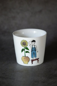 SOLO COLOURED CUP - BOY WITH SUNFLOWER (Bonsai Boy)